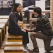 asian couple in an empty coffee shop being proposed to